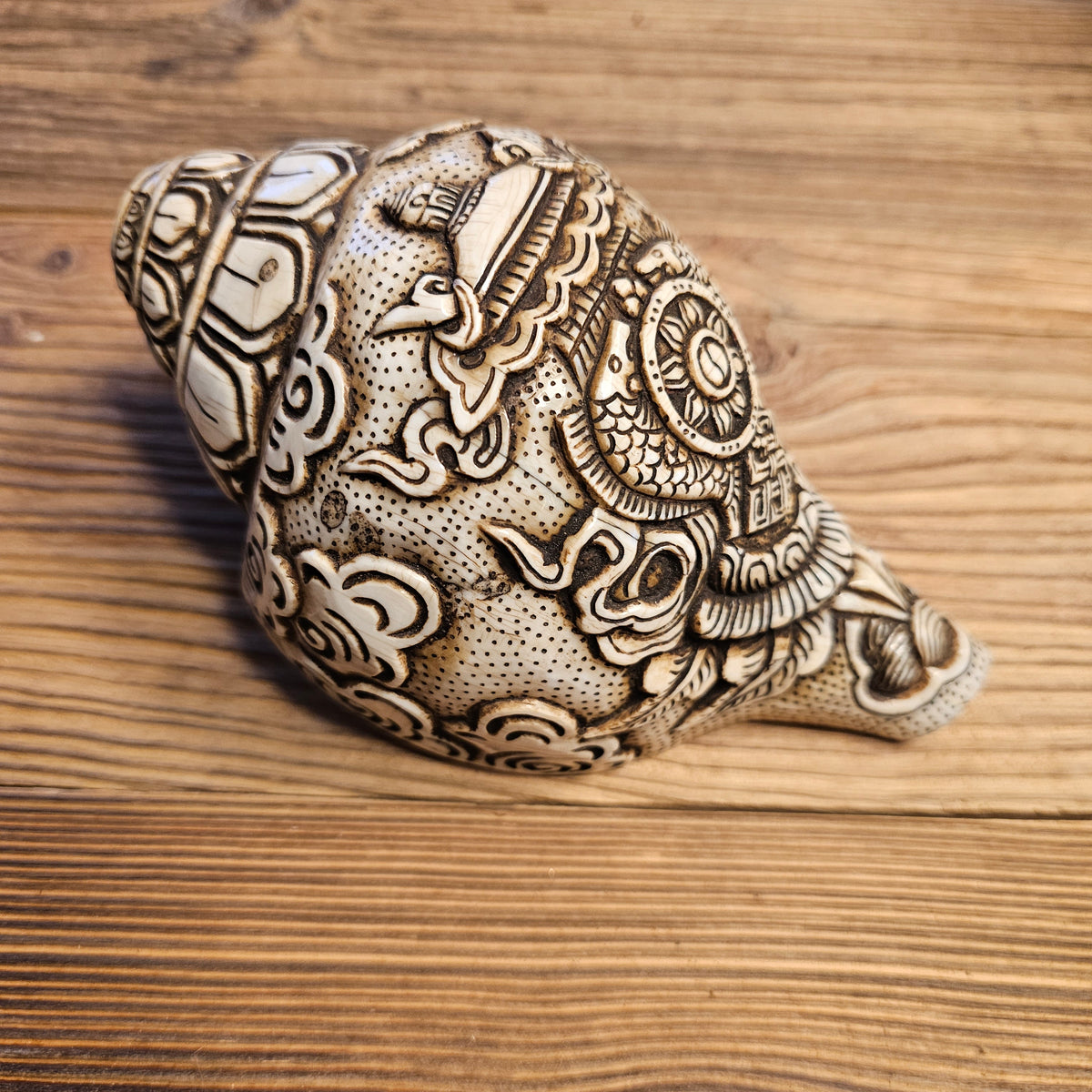 Muschelhorn Rad des Dharma